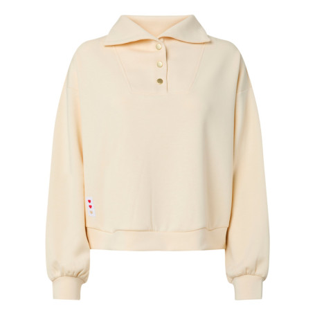 Sweat beige uni avec une coupe droite et un col...