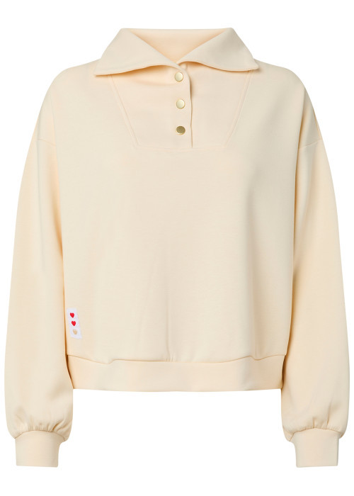 Sweat beige uni avec une coupe droite et un col à revers avec boutons
