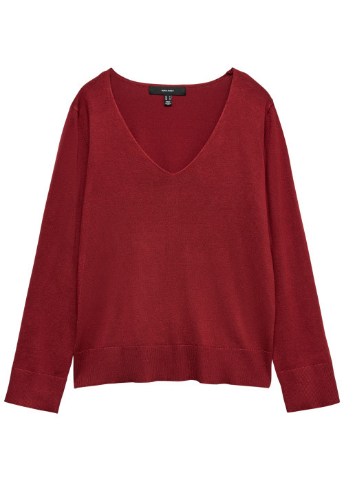 Pull rouge uni avec une coupe droite et des...