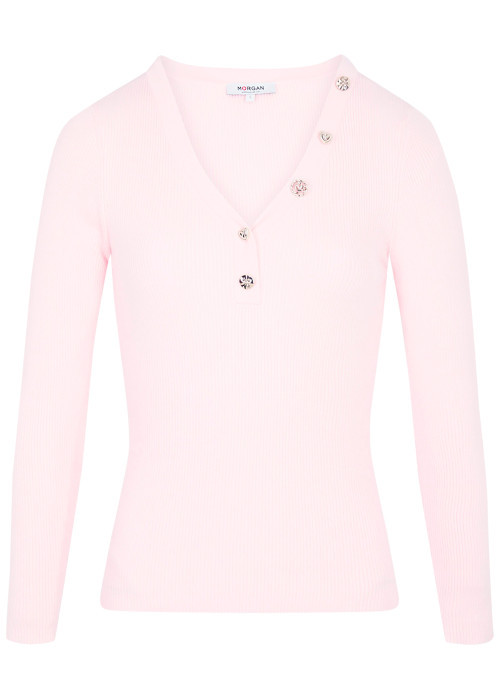 Top rose uni avec une coupe moulante et des manches longues