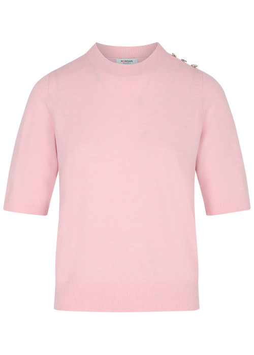 Pull rose uni avec une coupe droite et des...