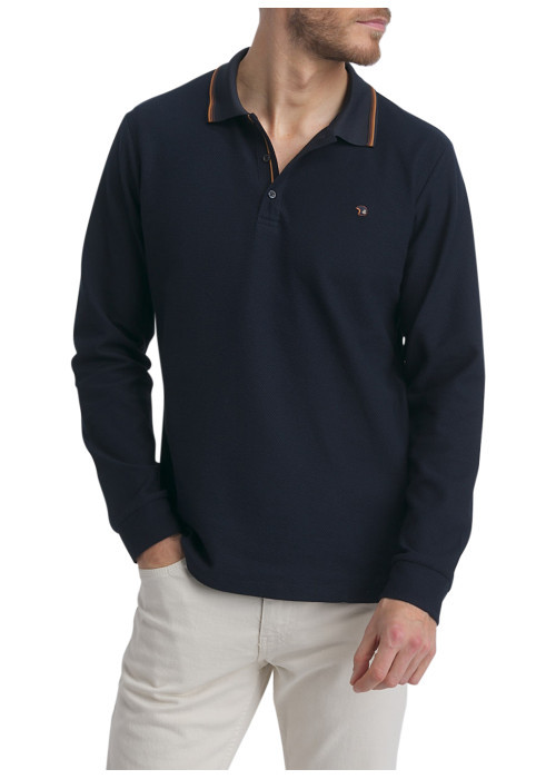 Polo en coton bleu marine uni munie d'une coupe droite et un col boutonné