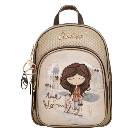 Sac à dos beige à motifs pourvu de bretelles...