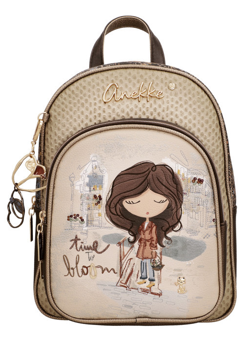 Sac à dos beige à motifs pourvu de bretelles...