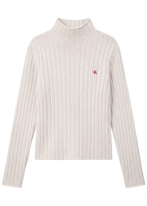 Pull en coton blanc pourvu d'une coupe ajustée...