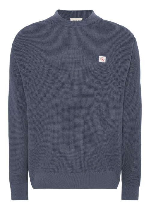Pull en coton bleu pourvu d'une coupe ample et d'un col rond épais