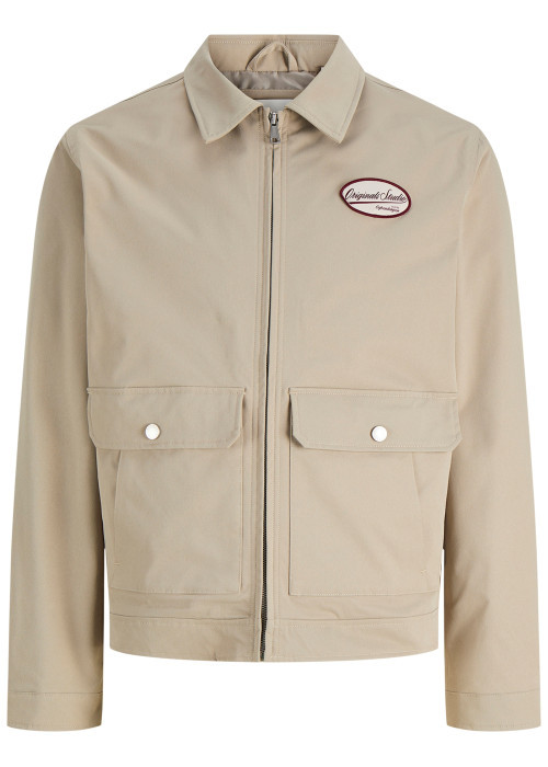 Blouson beige à coupe droite pourvu d'un col à...