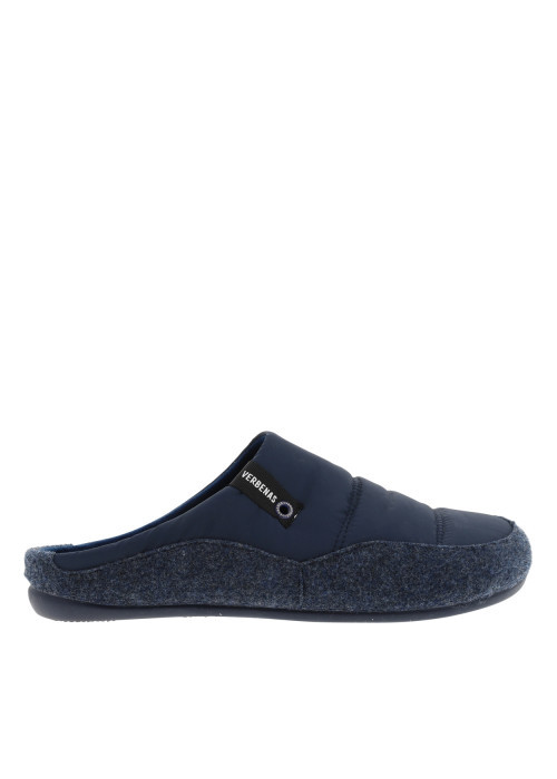 Mules bleu marine à talon plat avec une semelle...