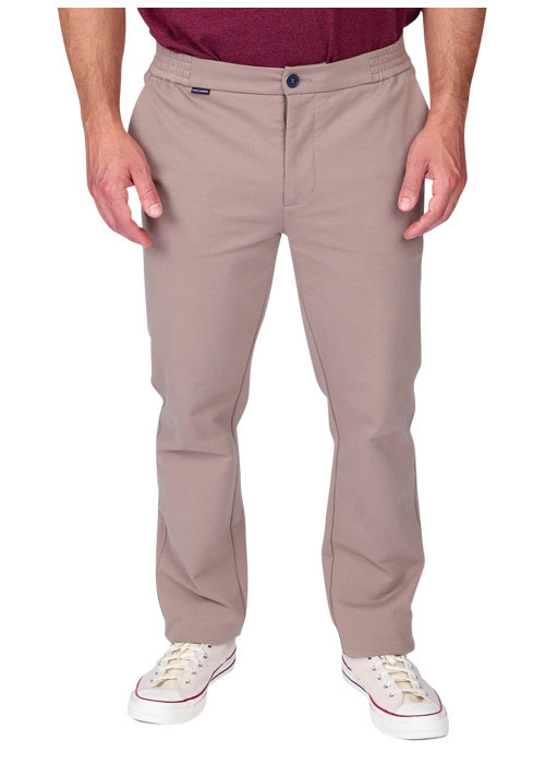 Pantalon beige à coupe droite pourvu d'un bouton et de poches