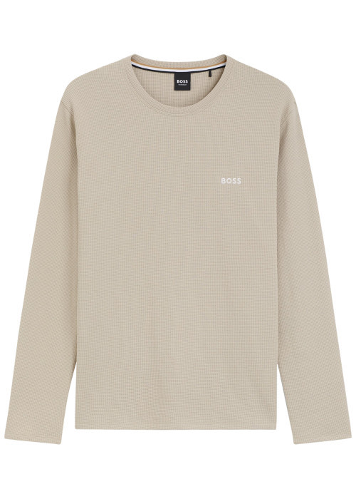 T-shirt beige uni avec une coupe droite et des...