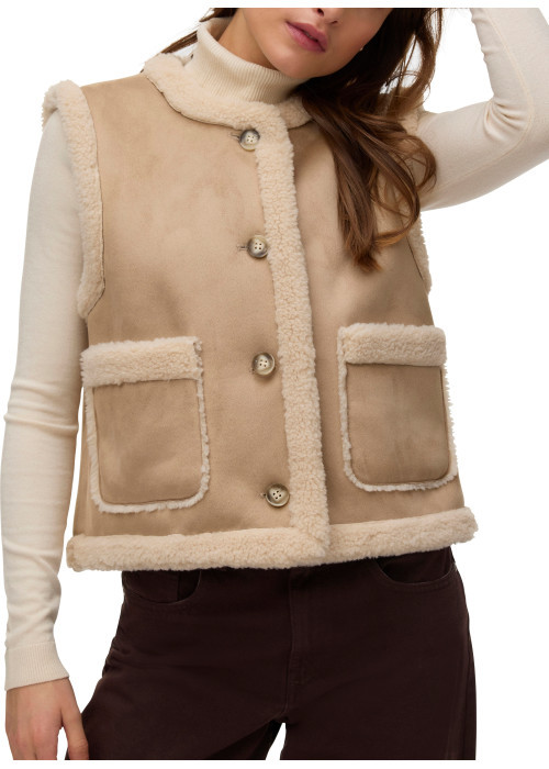 Gilet beige sans manches avec des bordures...