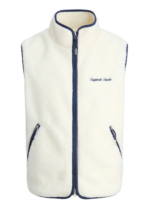 Blouson sans manches écru et bleu uni en sherpa avec un col montant