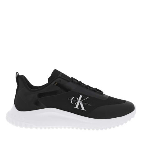 Baskets basses noires avec des lacets ronds et...