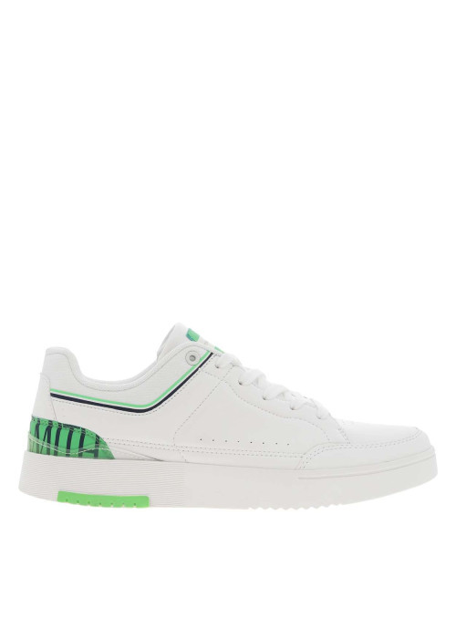 Baskets basses tennis blanches à lacets plats avec détails verts et marine