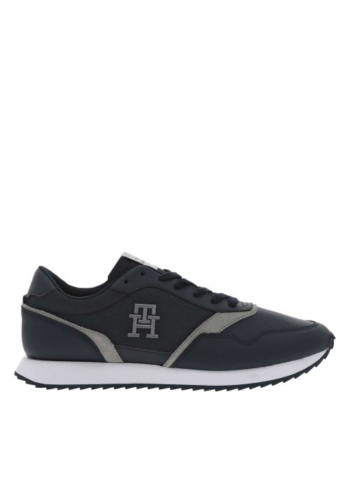 Baskets basses running en cuir bleu marine avec lacets plats et monogramme