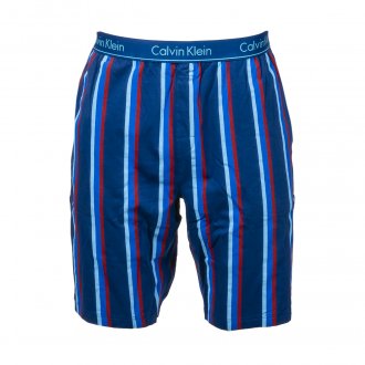 Pyjama court Calvin Klein en coton stretch : tee-shirt col rond bleu indigo et short bleu indigo à rayures rouges et bleu turquoise