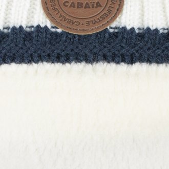 Bonnet Cabaïa blanc à motifs flocons bleu marine avec pompons interchangeables