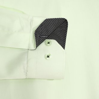 Chemise cintrée Méadrine en coton vert à opposition noire à pois blancs